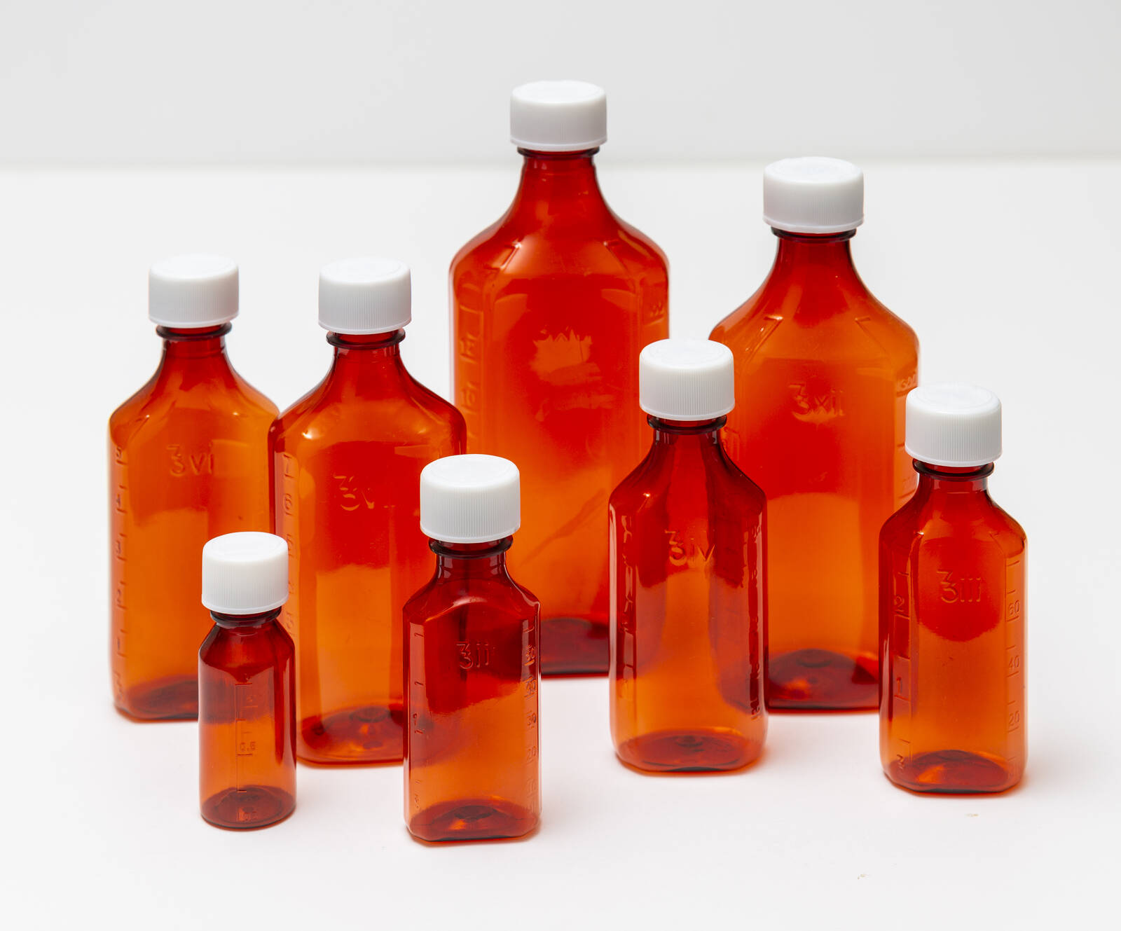 16 oz Amber Graduated Oval RX Bottles with Child-Resistant Caps